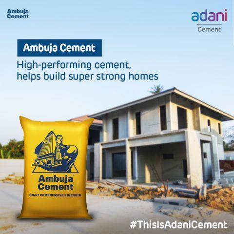 Explore Ambuja Cement for High-Performance Construction - Trusted to build super strong homes Advertisement featuring a pack of Ambuja Cement with a partially constructed house in the background, highlighting the strength and quality of Ambuja Cement